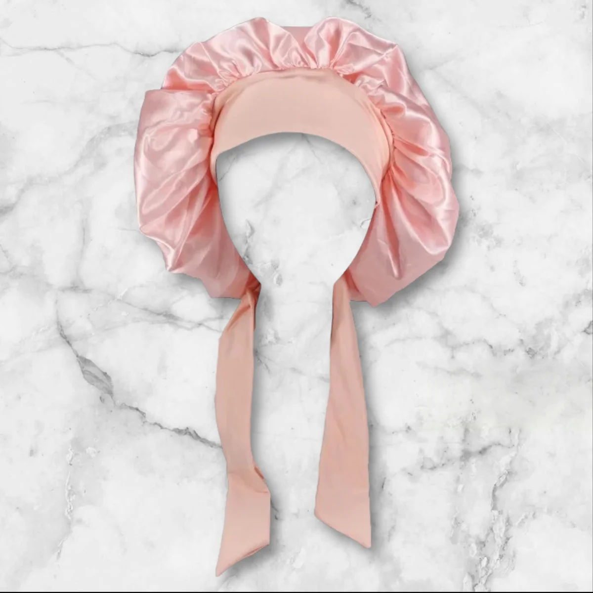 A silk bow tie bonnet.