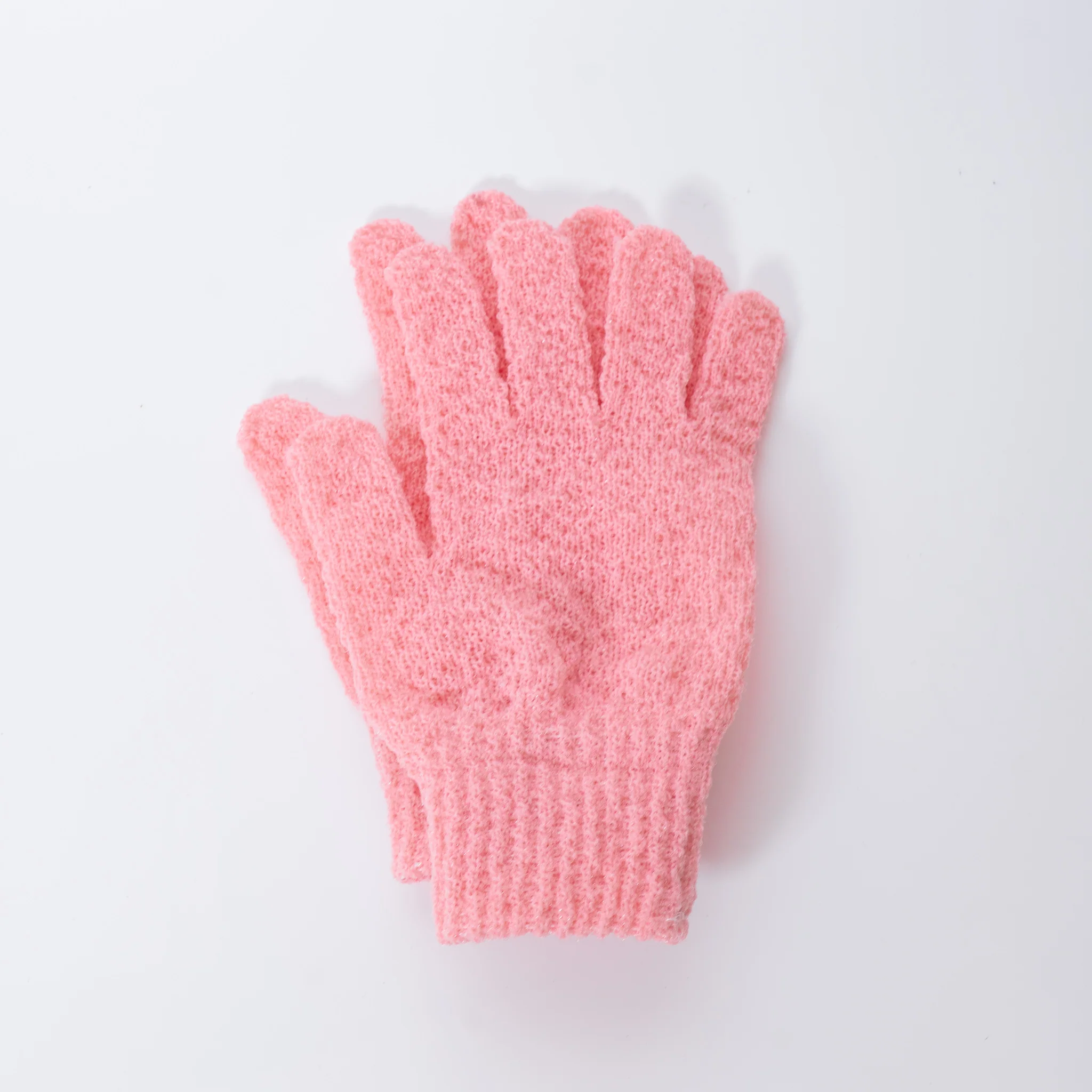 A vibrant pink exfoliating glove.